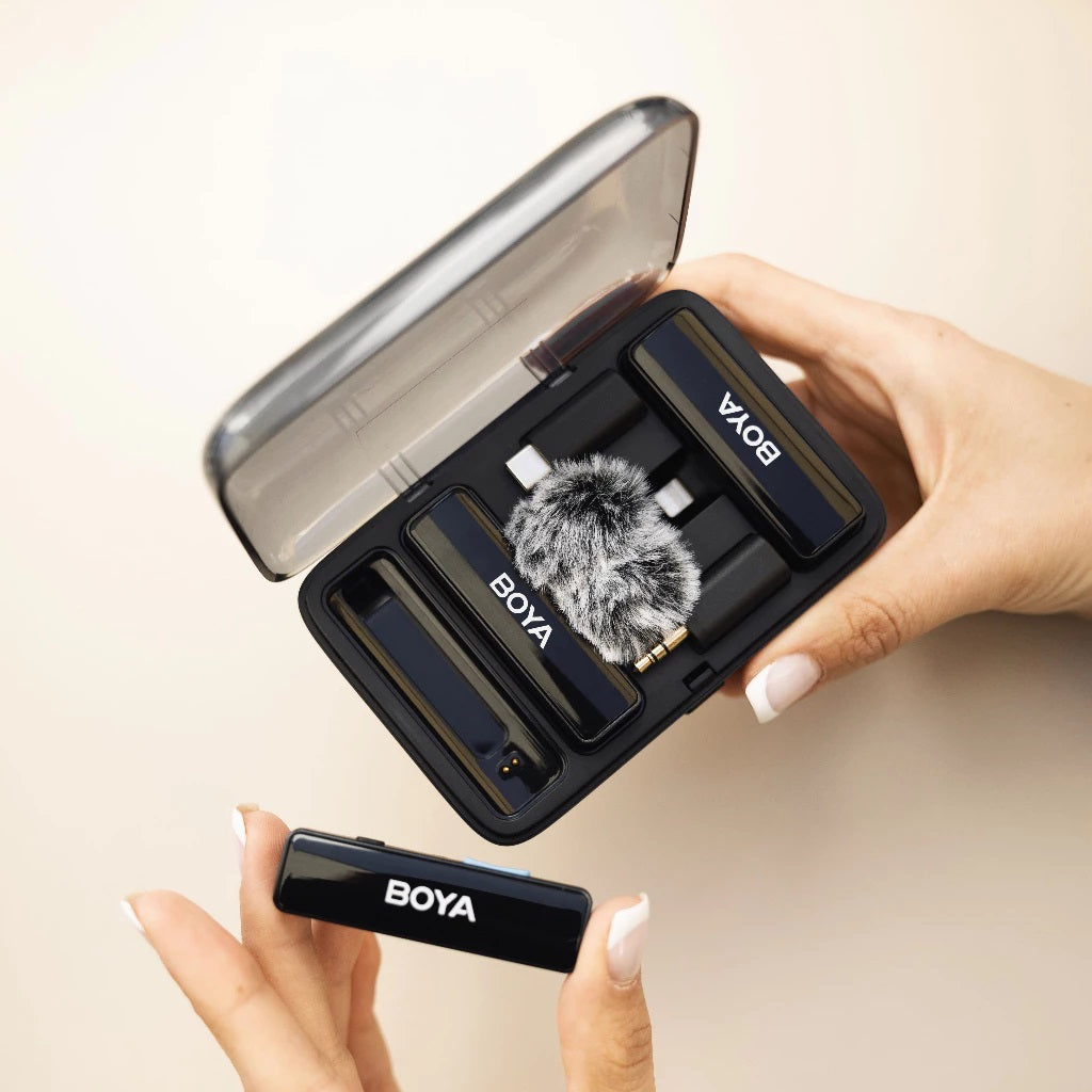 Wireless lavalier microphone with charging box neatly organized for easy portability