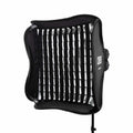 Studio lighting softbox for photographers featuring a grid for controlled light dispersion