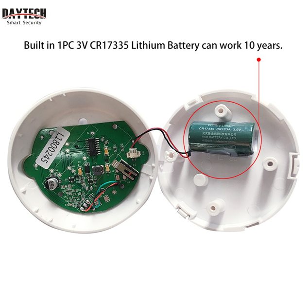 DAYTECH SM06TA smoke detector open view showing internal circuit board and built-in 3V lithium battery