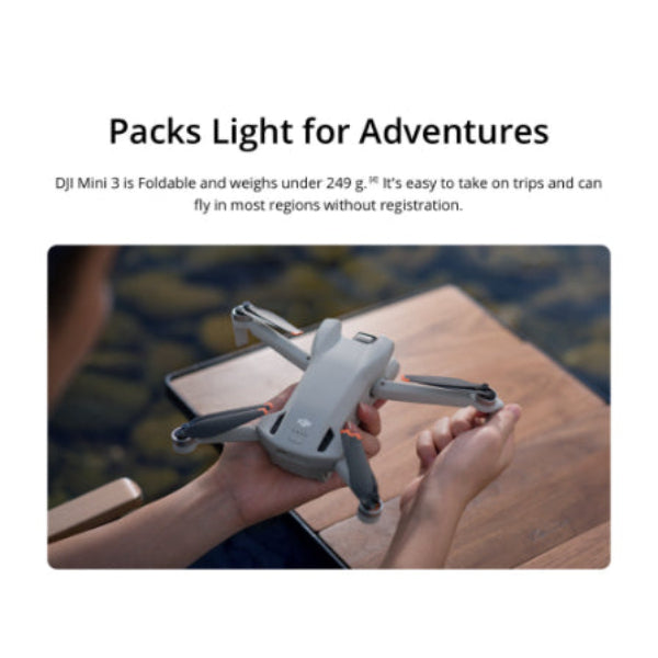 DJI Mini 3 drone with 4K camera held in hands showing its foldable design for easy travel