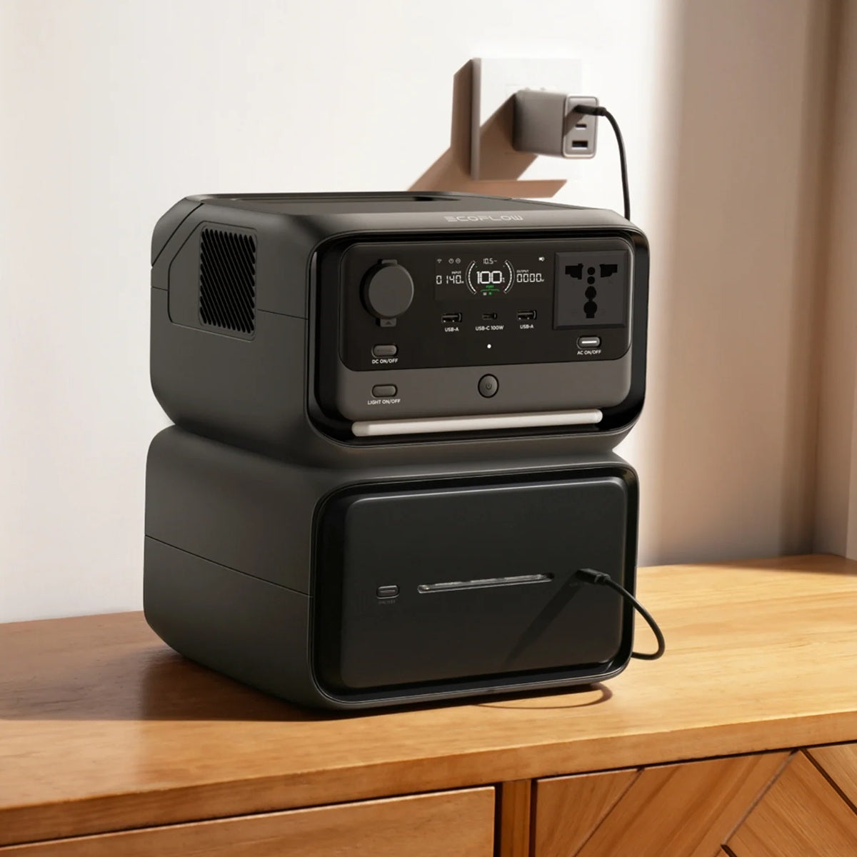 Ecoflow River 3 Max Plus Portable Power Station charging devices on wooden table
