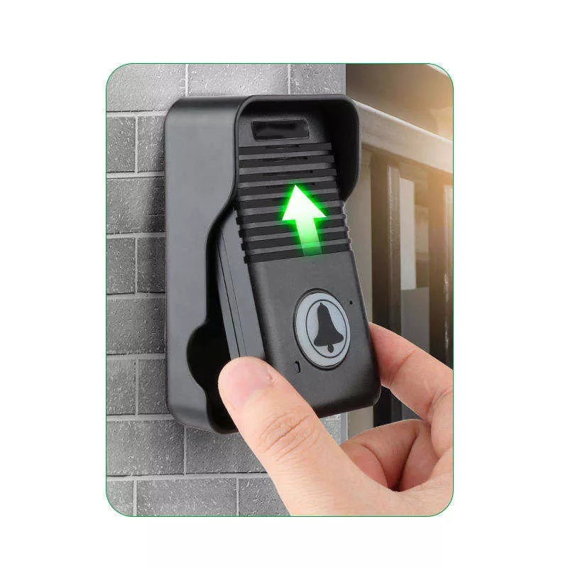Full Duplex Intercom Doorbell black unit being pressed on a gray brick wall