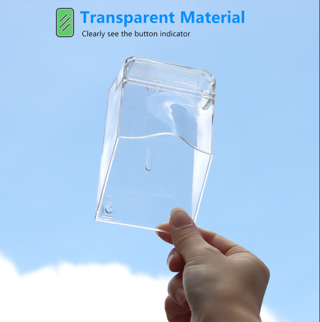 Transparent waterproof doorbell cover case held against a blue sky background