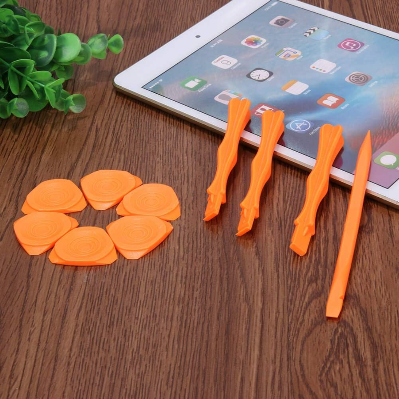 Professional phone repair tool kit with orange prying tools and opening picks for easy mobile repairs