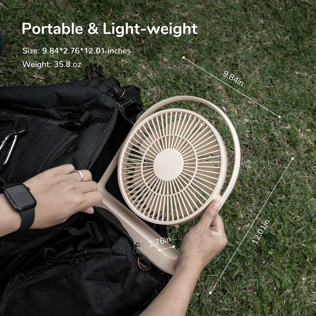 Portable rechargeable desk fan in beige being placed into a black backpack outdoors