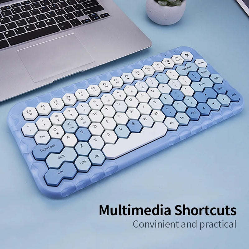 MOFII HONEY BT keyboard with hexagonal keys in blue and white featuring multimedia shortcuts