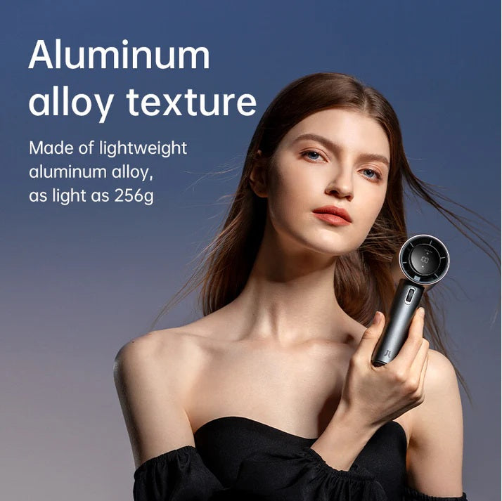 Portable mini handheld fan made of lightweight aluminum alloy held by woman