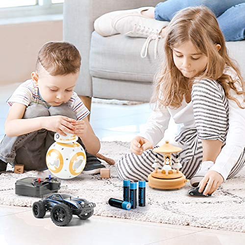 Two children playing with toys powered by AA Battery 1.5v Non-Rechargeable Alkaline Batteries on a rug