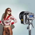 Synco COLBOR lighting accessories shown with a model posing in stylish attire and vibrant lighting setup