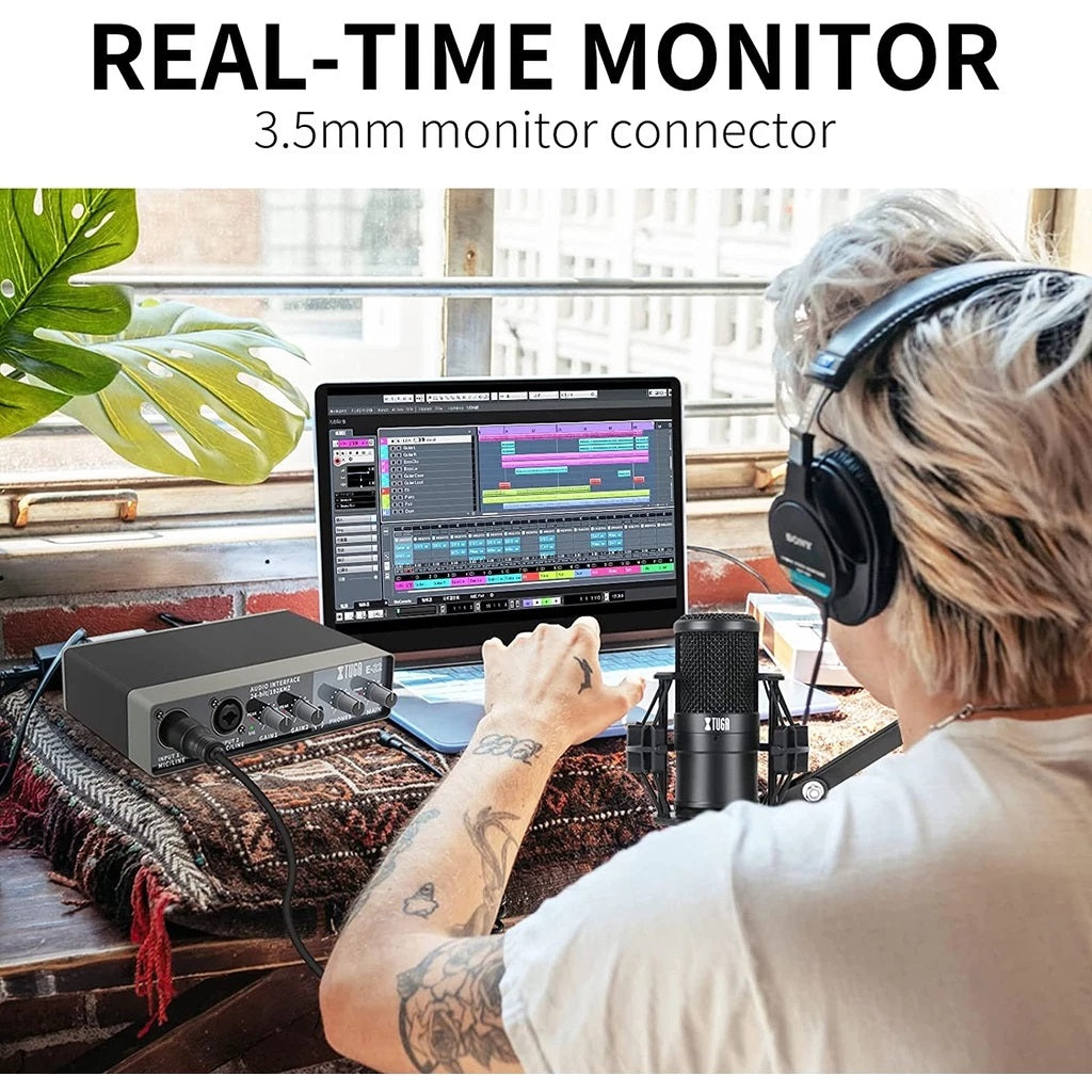 XTUGA E22 professional sound card on desk with condenser mic headphones and DAW on laptop