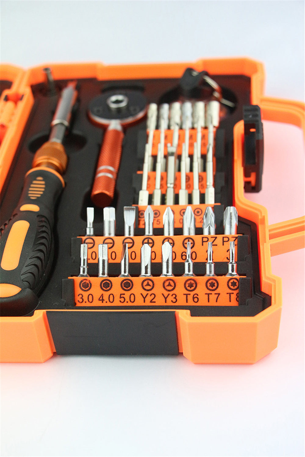 JAKEMY JM-8146 toolkit in orange case with various screwdrivers and bits organized for repair tasks