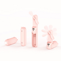 VMIDirect portable mini fan power bank in pink handheld design with foldable blades and USB charging port