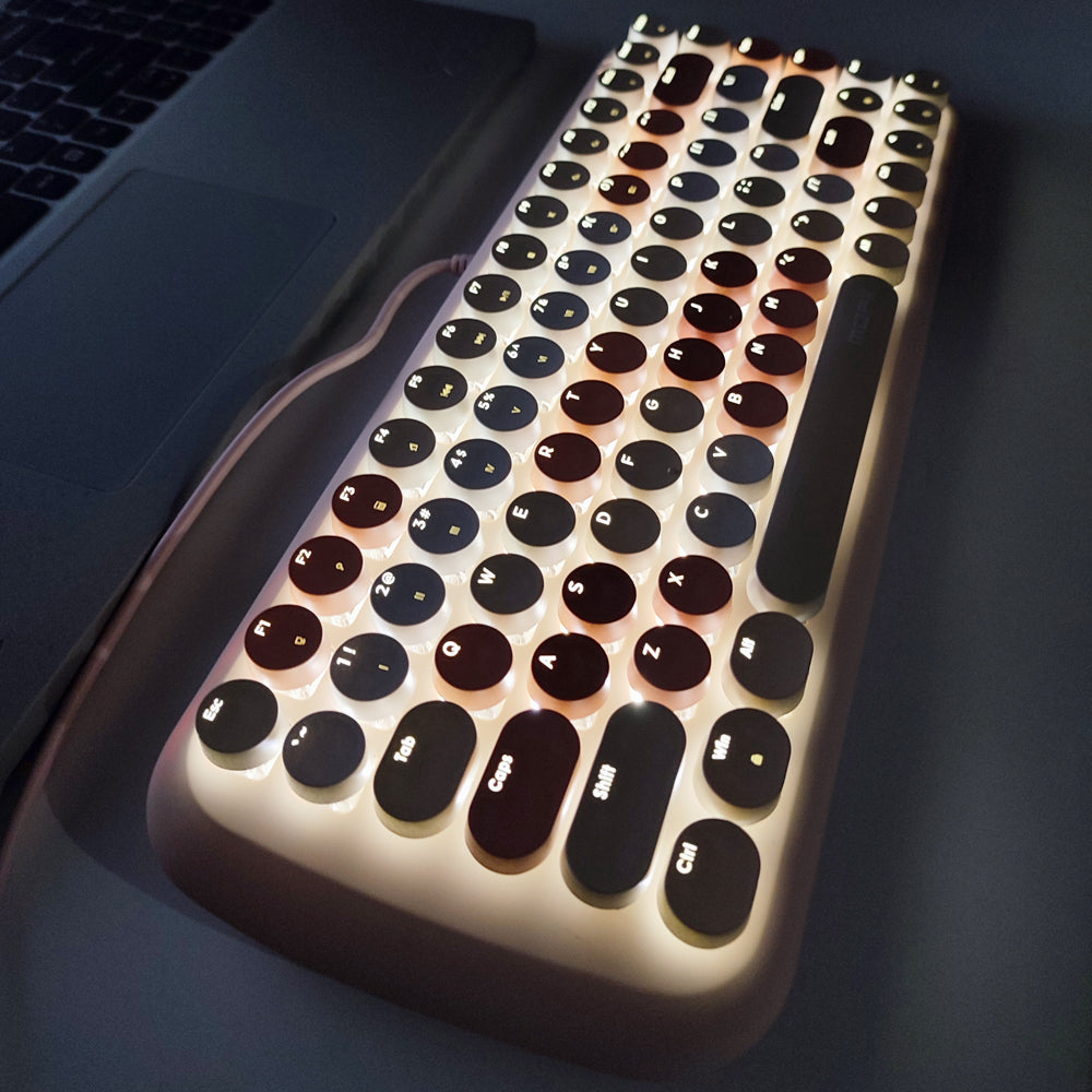 MOFII Candy M keyboard with lights featuring round black and brown keys and white backlighting