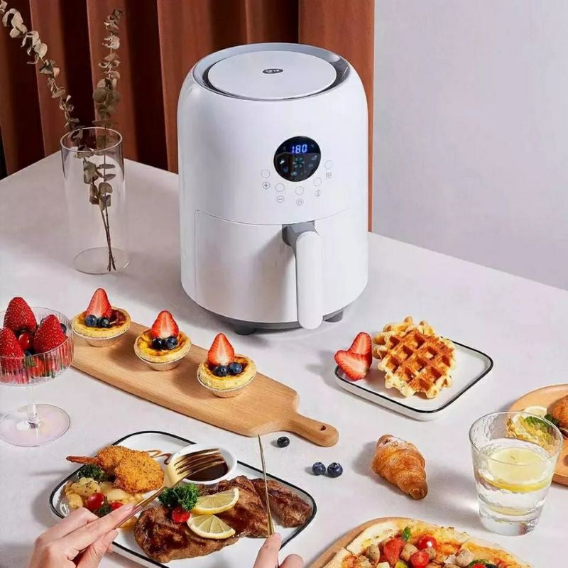 Smart Electric Air Fryer with various dishes including fruits and waffles on a dining table