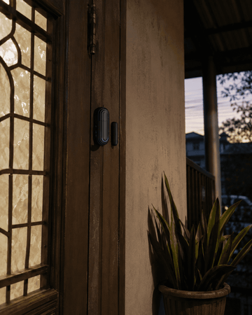 Daytech wireless door alarm sensor mounted on a Filipino home's front door to prevent dementia wandering