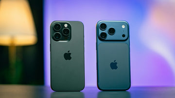 Two iphones side by side on a table
