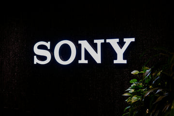 The sony logo is illuminated on a dark background