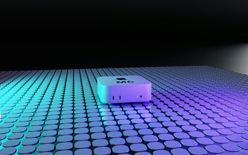 A small white square device on a grid of glowing blue and purple tiles