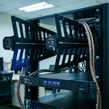 XTUGA GA816 wireless antenna distribution system mounted in an office AV rack