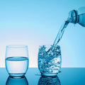 Acrylic Reflective Display Board showcasing water being poured into a glass