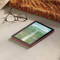 VMIDirect HD Tablet displaying John Grisham's The Guardians on a cozy surface with glasses