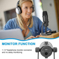 BOYA PM700 USB condenser microphone on desk with woman wearing headphones for recording and monitoring
