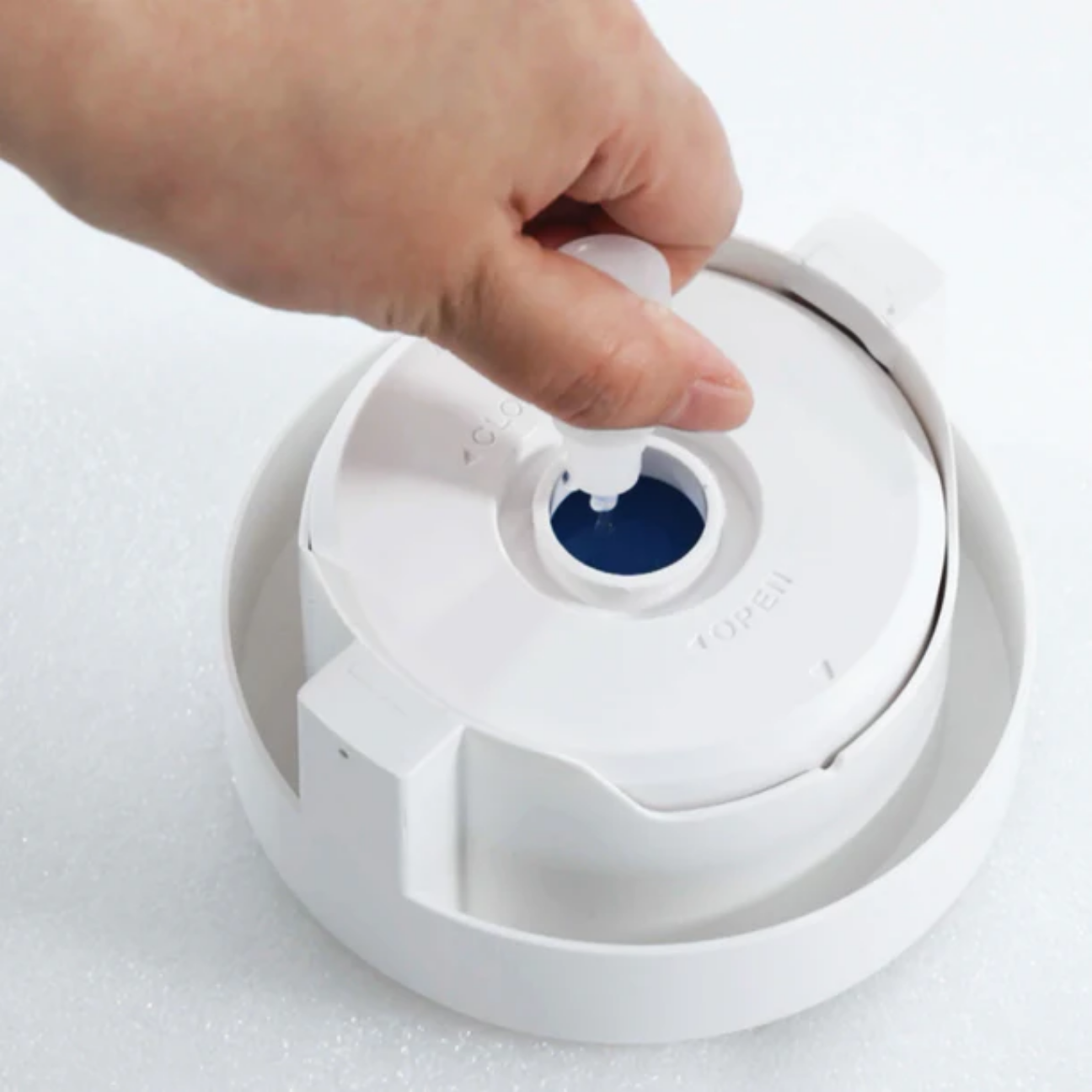 VMIDirect Deodorization Hydrogel dispenser being filled for effective odor and strain removal