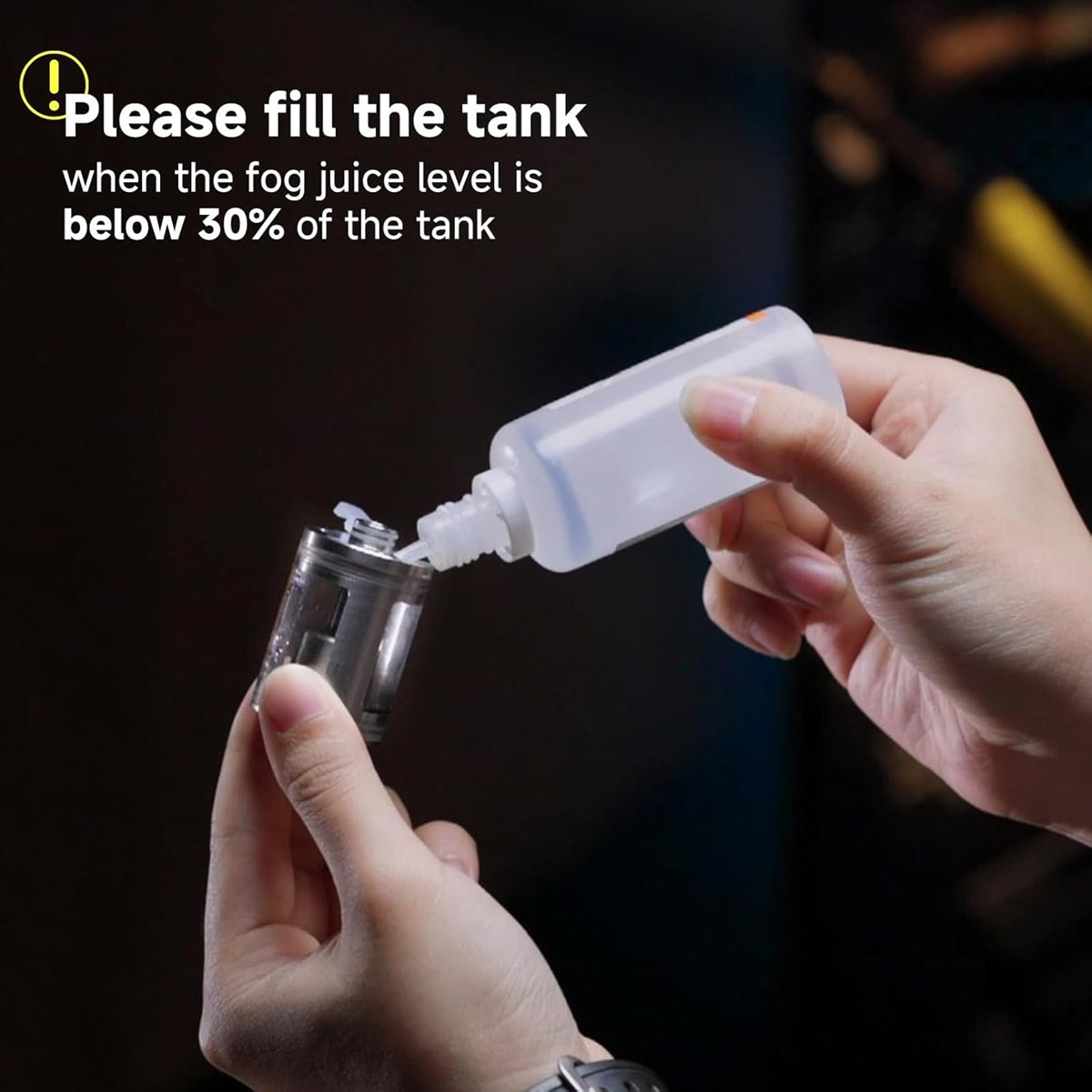 Filling the tank with fog machine liquid for COLBOR CF5 showing clear instructions for use