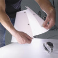 Adjustable Cone Flash Diffuser being placed for optimal lighting on a watch during a photoshoot