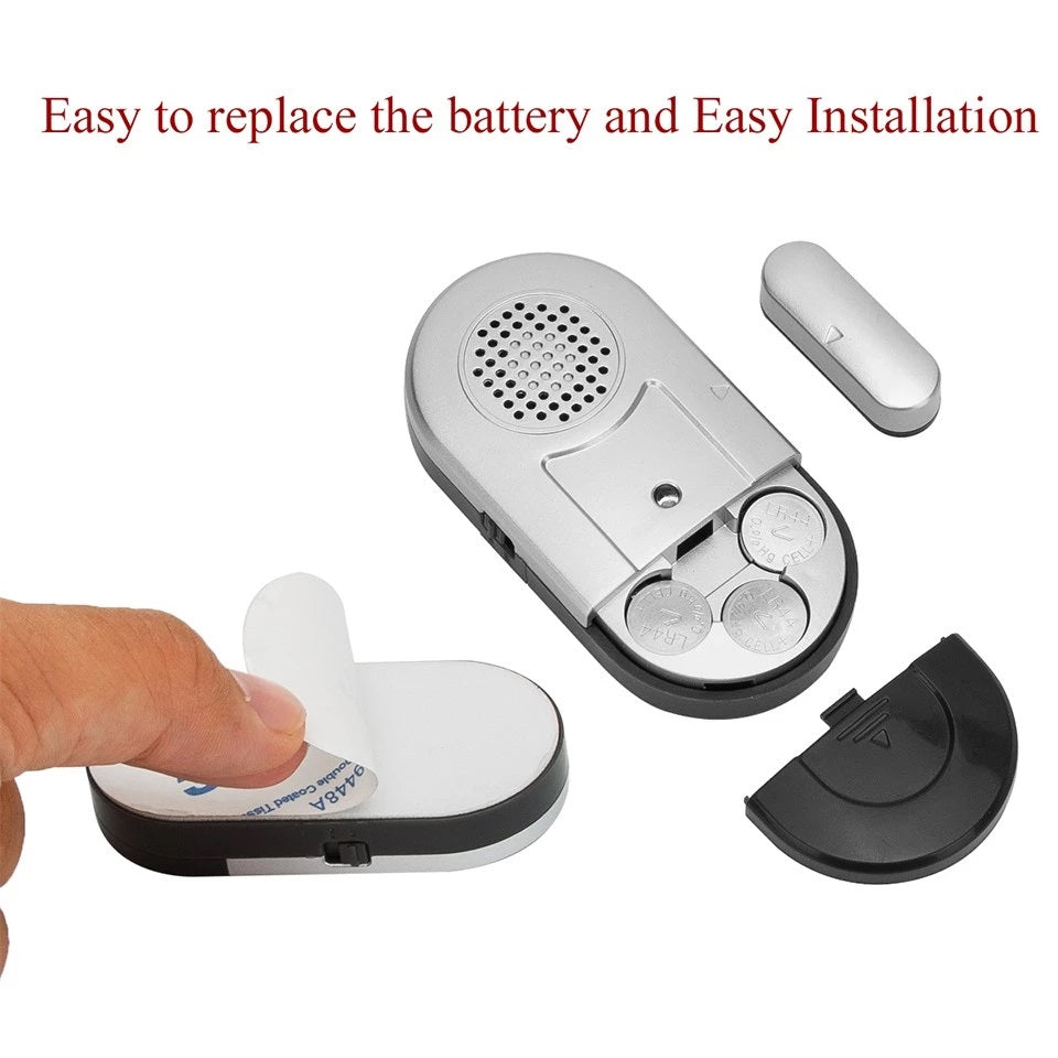 Affordable wireless alarm for doors and window showing easy battery replacement and installation
