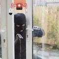 Affordable Wireless Alarm for Doors and Window showing security sensor detecting intruder at glass door