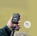 VMIDirect action camera held in hand displaying screen settings for outdoor photography