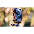 VMIDirect Action Camera mounted on a tripod, showcasing its display and durable design