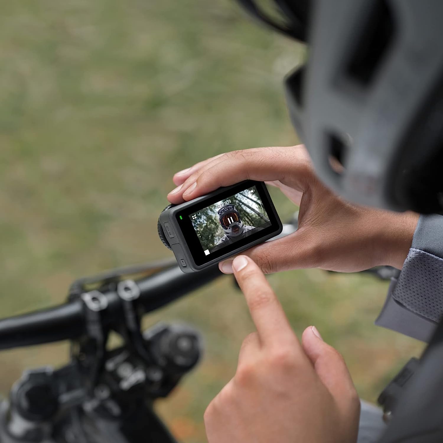 VMIDirect action camera being used to capture outdoor adventure footage with touchscreen controls
