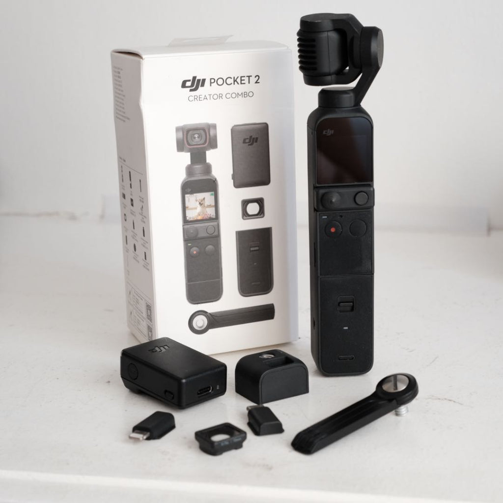 VMIDirect handheld AI Gimbal Camera with accessories and packaging for stable video recording