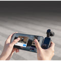 VMIDirect handheld AI Gimbal Camera in use, showcasing video recording on a smartphone screen