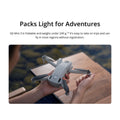 DJI Mini 3 drone with 4K camera held in hands showing its foldable design for easy travel