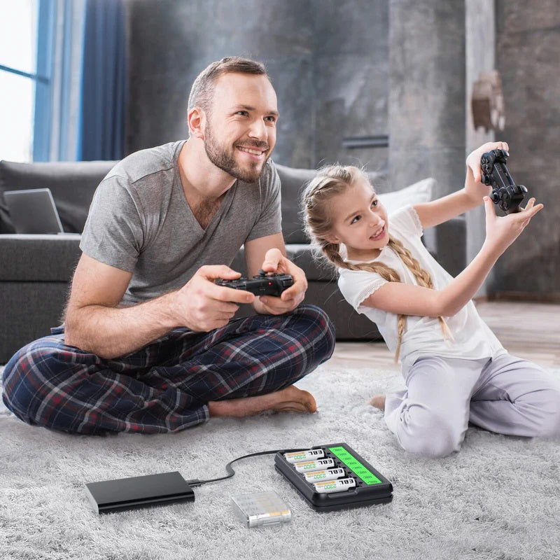 EBL FY-819 LCD charger with AA AAA rechargeable batteries next to father and daughter playing video games