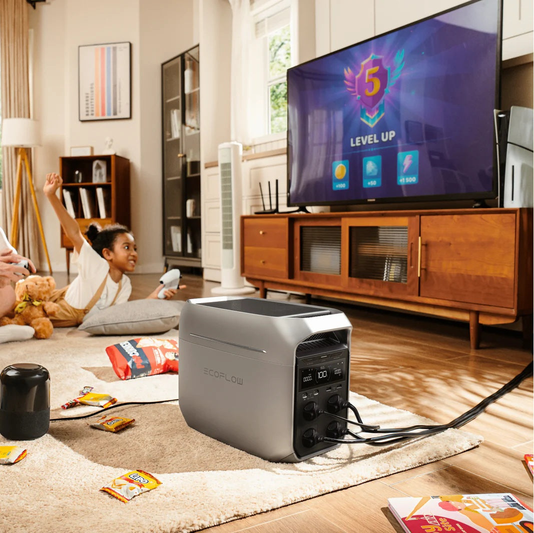 DELTA 3 Portable Power Station powering TV in living room with child playing video games nearby