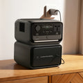 Ecoflow River 3 Max Plus Portable Power Station charging devices on wooden table