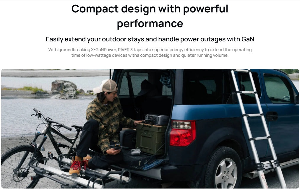 EcoFlow RIVER 3 portable power station in vehicle trunk with person and bicycle by lakeside