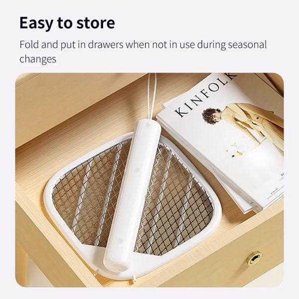 Electric Mosquito Swatter Racket neatly stored in a drawer, showcasing its compact design and easy storage feature