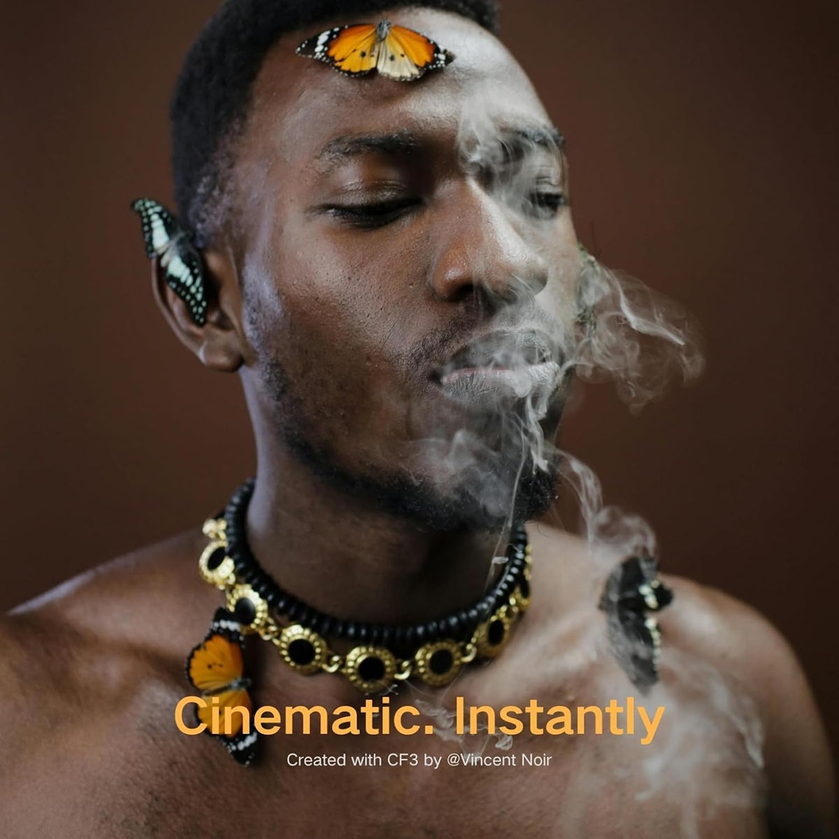 Fog machine smoke machine producing dramatic effects with colorful butterfly accents