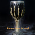Halloween-themed goblet with skeleton hand design surrounded by fog from fog machine smoke machine