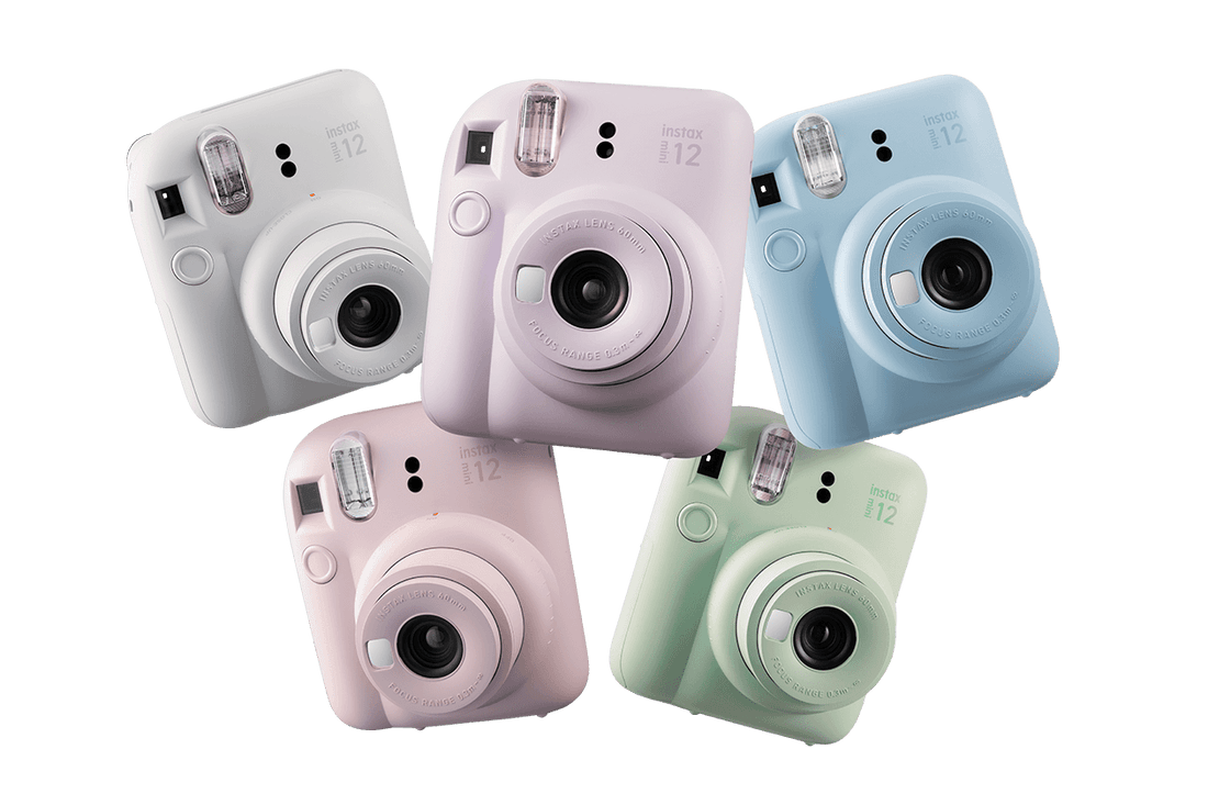 Fujifilm Instax Mini Film Cameras in various colors with instant photo prints displayed