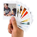 Fujifilm Instax Square Glossy Film 20 Sheets displayed in hand with various instant photos