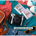 Fujifilm Instax Wide Glossy Film 10 20 Sheets displayed with an instant camera on colorful clothing