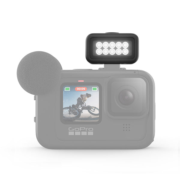 GoPro Light Mod attached to camera, enhancing low-light shooting for adventures and sports photography