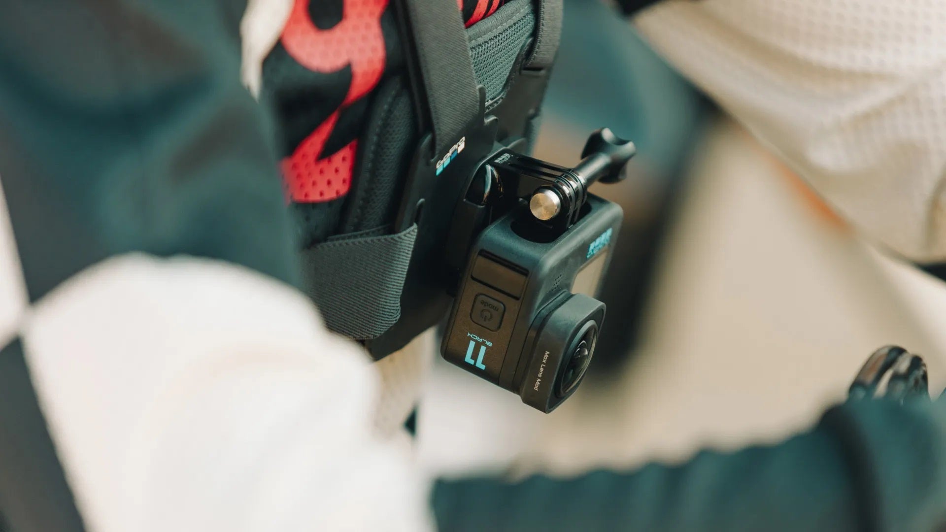 GoPro Max Lens Mod attached to a harness for enhanced action camera performance