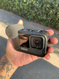 GoPro Media Mod attached to a GoPro camera for enhanced audio and visual capabilities